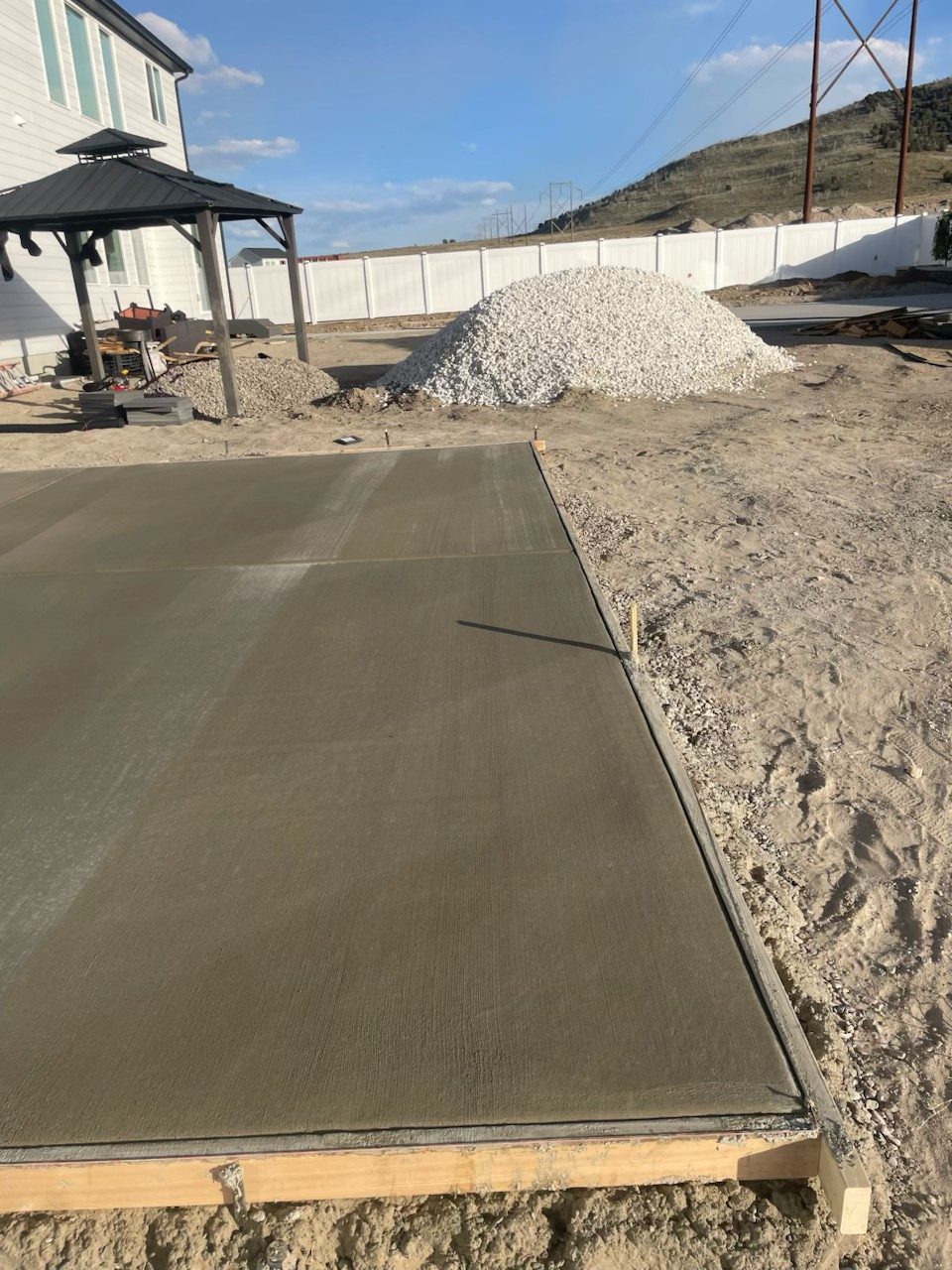 Backyard concrete slab poured by Firm Foundation of Utah in Lehi, UT