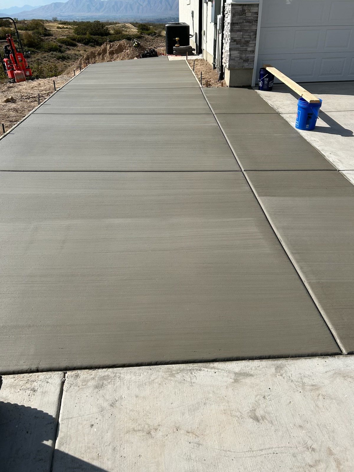 Concrete driveway poured by Firm Foundation of Utah in Lehi, UT