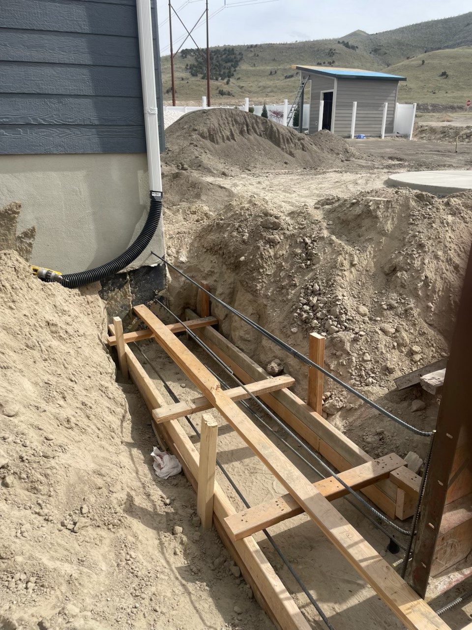 Footing forms and rebar set by Firm Foundation of Utah in Lehi, UT